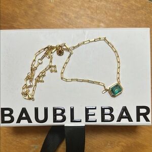 BaubleBar Gold Birthstone Necklace (December) with Blue Pendant